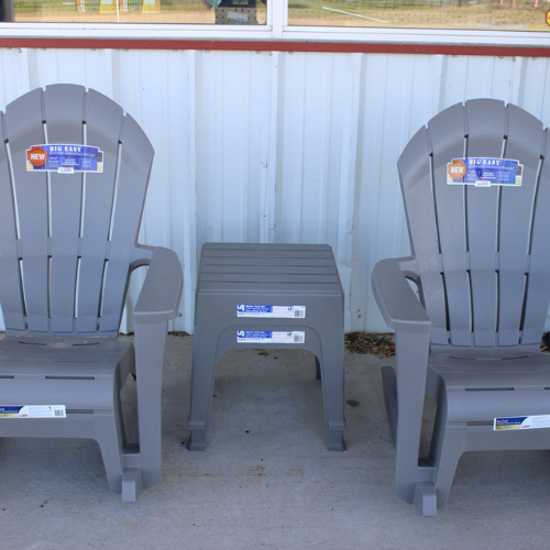 Plastic Adirondack chairs for sale outside of Rudy's Farm.
