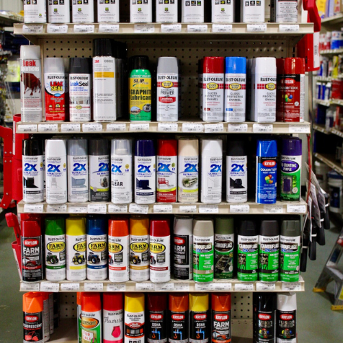 Spray cans on display inside of Rudy's Farm.