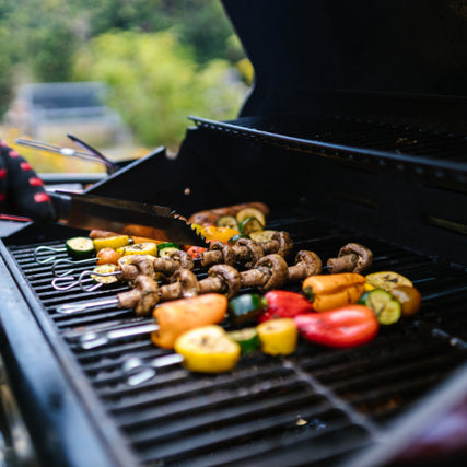 Outdoor Living SuppliesVegetables on a propane grill.